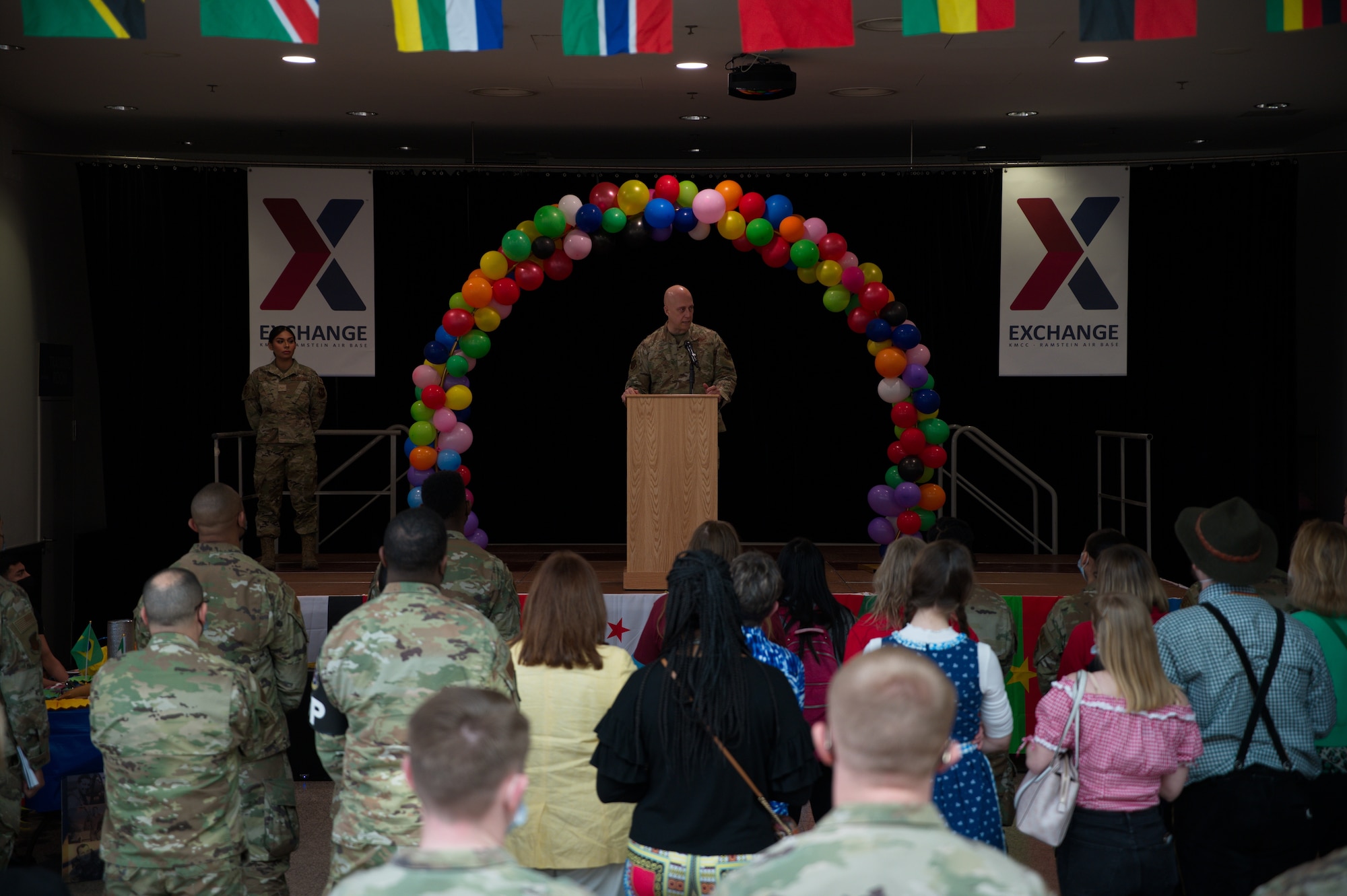 U.S. Air Force Brig. Gen. Josh Olson, 86th Airlift Wing commander, gives opening remarks at Diversity Day 2022 on Ramstein Air Base, Germany, March 24, 2022. The event aimed to enhance cross-cultural and cross-gender awareness while promoting harmony among all military members, their families and the DOD civilian workforce. (U.S. Air Force photo by Senior Airman Branden Rae)