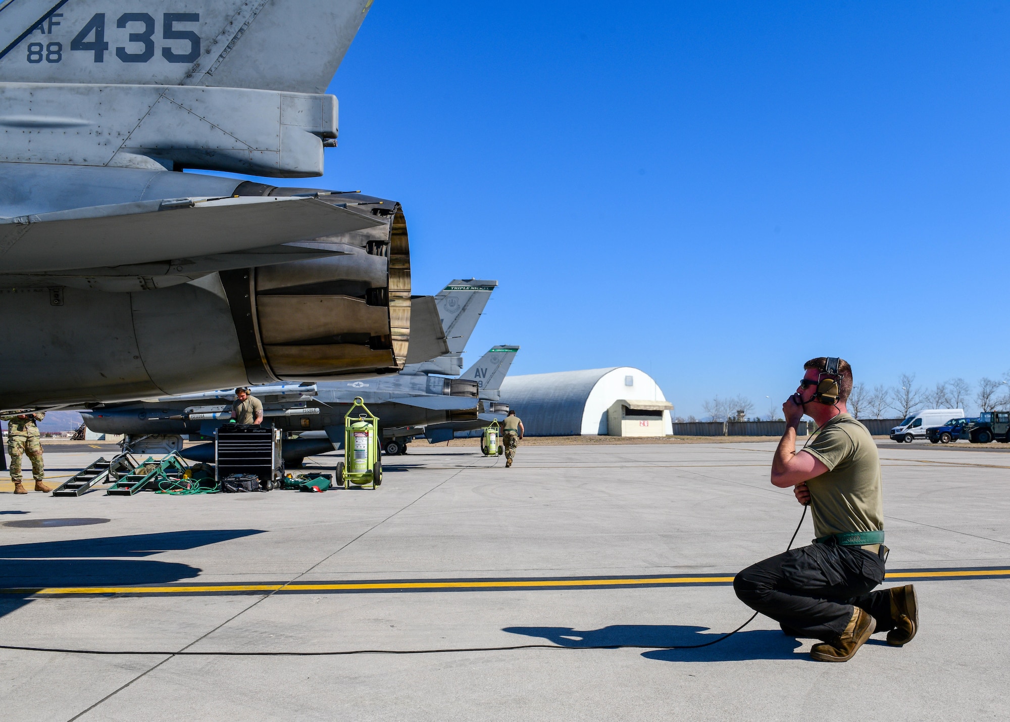 Airman 1st Class Andrew Moyer, 555th Aircraft Maintenance Unit F-16 Fighting Falcon crew chief, checks flight control movement on an F-16 at Aviano Air Base, Italy, March 23, 2022. The 555th AMU’s operations support NATO’s statement of Alliance resolve and cohesion during enhanced air policing. Maintainers help ensure Allied fighters fly air patrol missions along the Alliance’s Eastern flank. (U.S. Air Force photo by Senior Airman Brooke Moeder)