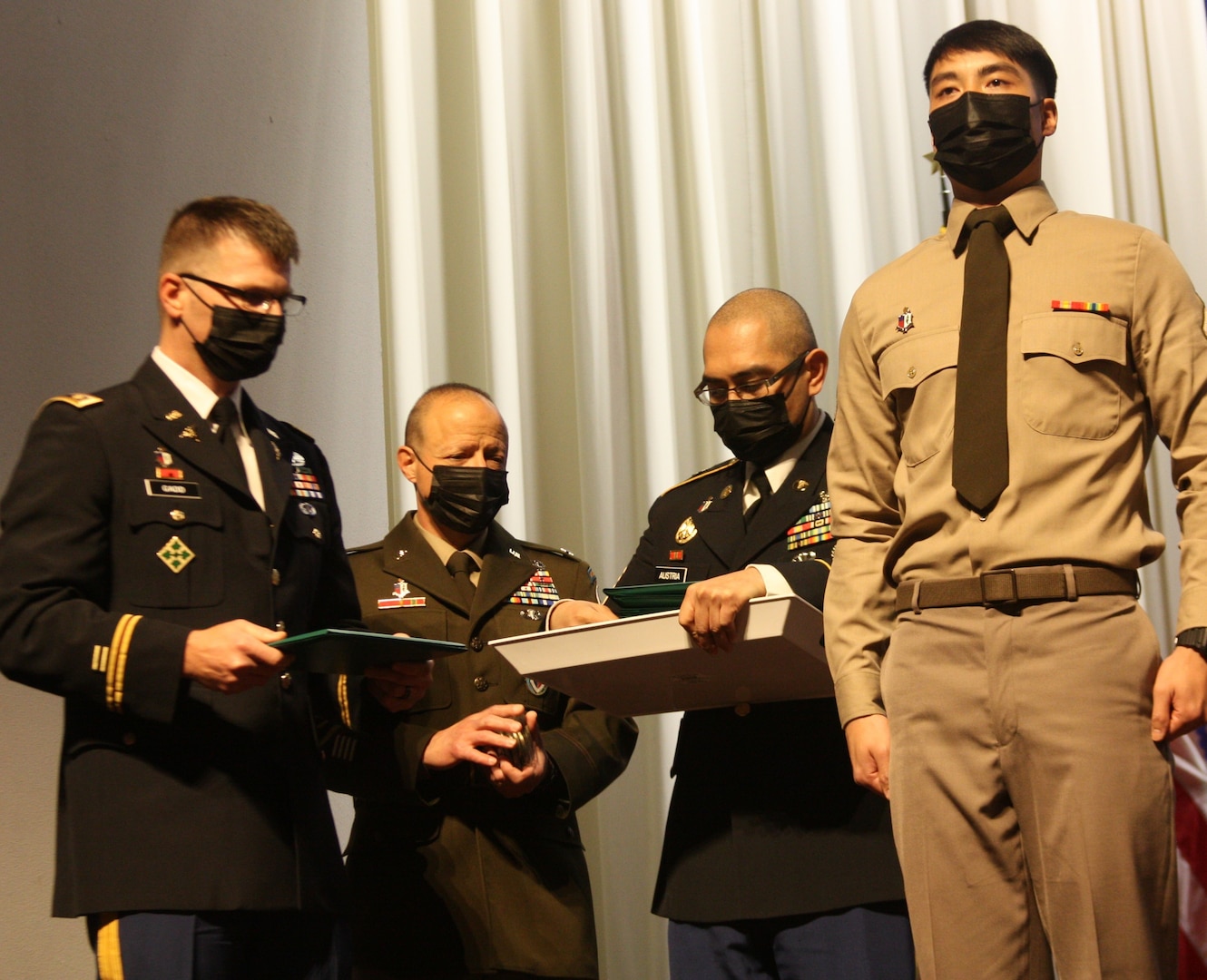 Leadership at Walter Reed National Military Medical Center and for Phase II of the Practical Nurse Course at WRNMMC recognize Pfc. Simon Chen as the distinguished honor graduate of the PNC Class 21-004, which graduated March 21.