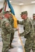 (Left to Right) Command Sgt. Maj. Shawn Phillips, command sergeant major of the 55th Maneuver Enhancement Brigade, is passed the brigade colors from Lt. Col. Brad Pierson, incoming commander of the 55th MEB, during the 55th MEB change-of-command ceremony at Fort Indiantown Gap, Pa., on March 26, 2022.