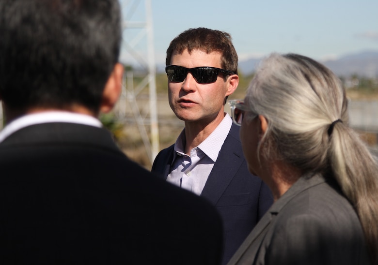 Edward Belden, center, environmental specialist with the Bureau of Engineering with the City of Los Angeles, briefs Assistant Secretary of the Army (Civil Works) Michael Connor, left, during a March 29 visit to the Los Angeles River for Connor and Maj. Gen. William Graham, U.S. Army Corps of Engineers deputy commanding general for Civil and Emergency Operations. At right is Deborah Weintraub, chief deputy city engineer for the City of Los Angeles.