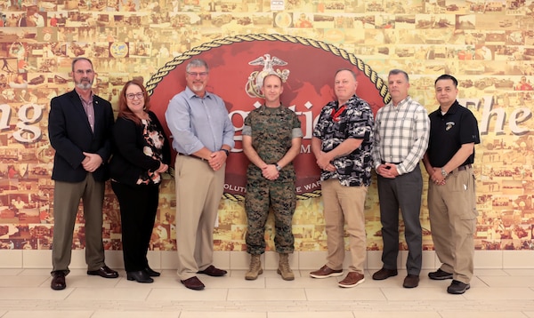 MARCORLOGCOM MEF Support Team assembles for a photograph while at Marine Corps Logistics Base Albany, Ga., March 31.