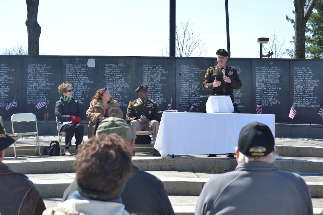 military officer speaks to crowd