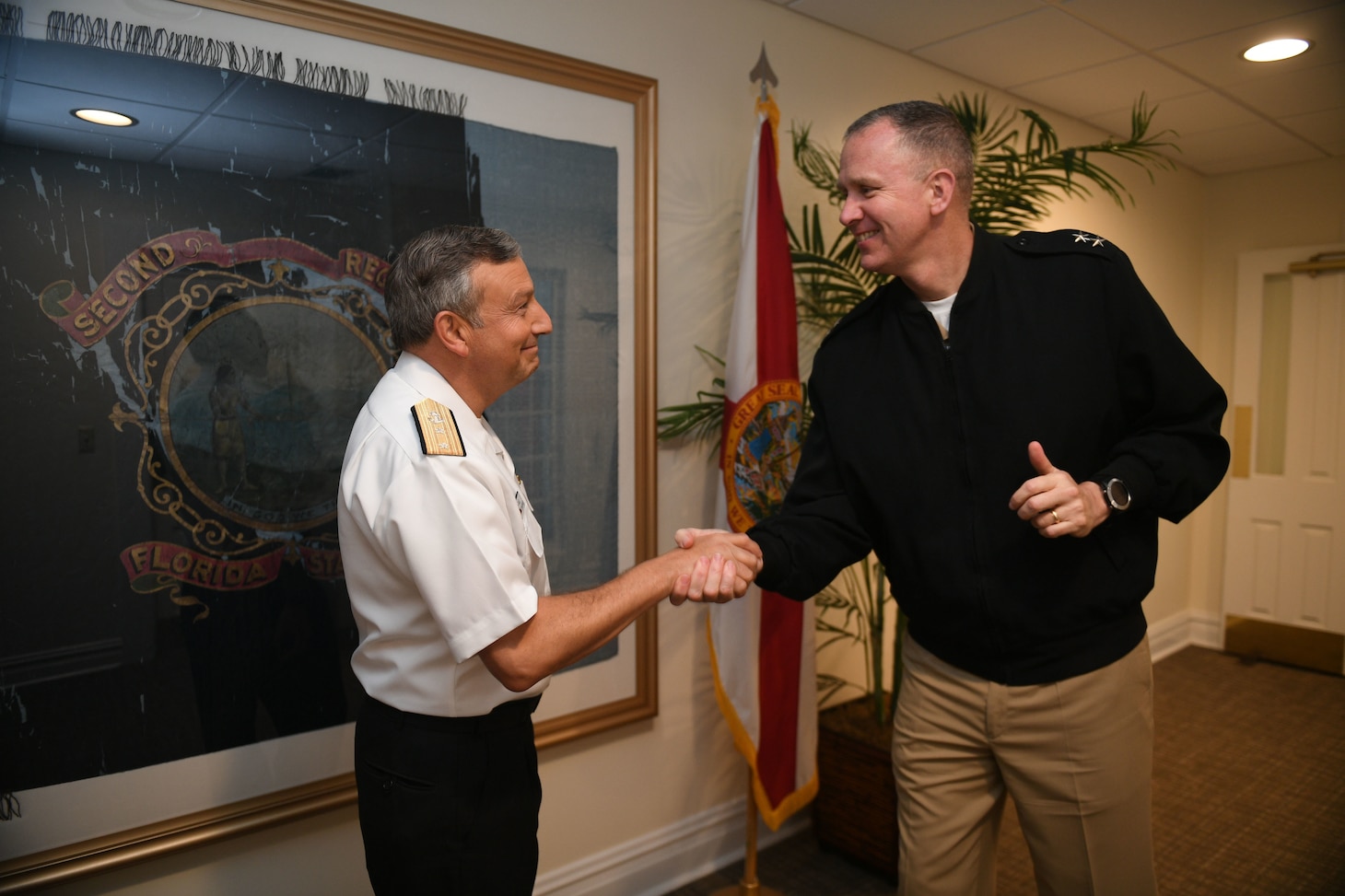 Rear Adm. Jim Aiken, Commander, U.S. Naval Forces Southern Command/ U.S. 4th Fleet, right, meets Rear Adm. Raul Zamorano, Deputy Chief of the Navy General Staff (EMGA) of the Chilean Navy (Amada de Chile) at the 26th annual Maritime Staff Talks (MST), March 29, 2022.. MSTs support the U.S. maritime strategy by building and strengthening working relationships with U.S. and partner nations.