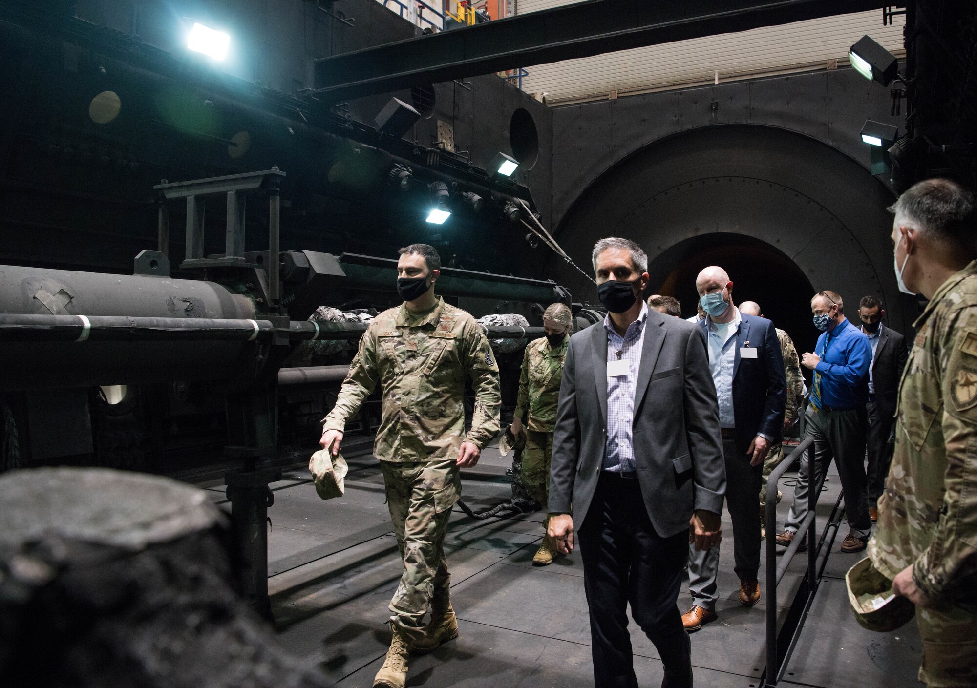 Group walking inside the J-6 test cell