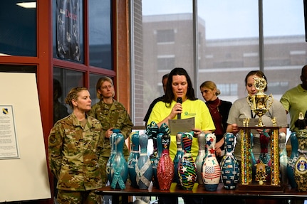 Amy Nowak, Sexual Assault Response Coordinator and SAPR Program Manager at JBAB and the National Capital Region, speaks during a Sexual Assault Awareness and Prevention Month event at JBAB, Washington, D.C., March 31, 2022.