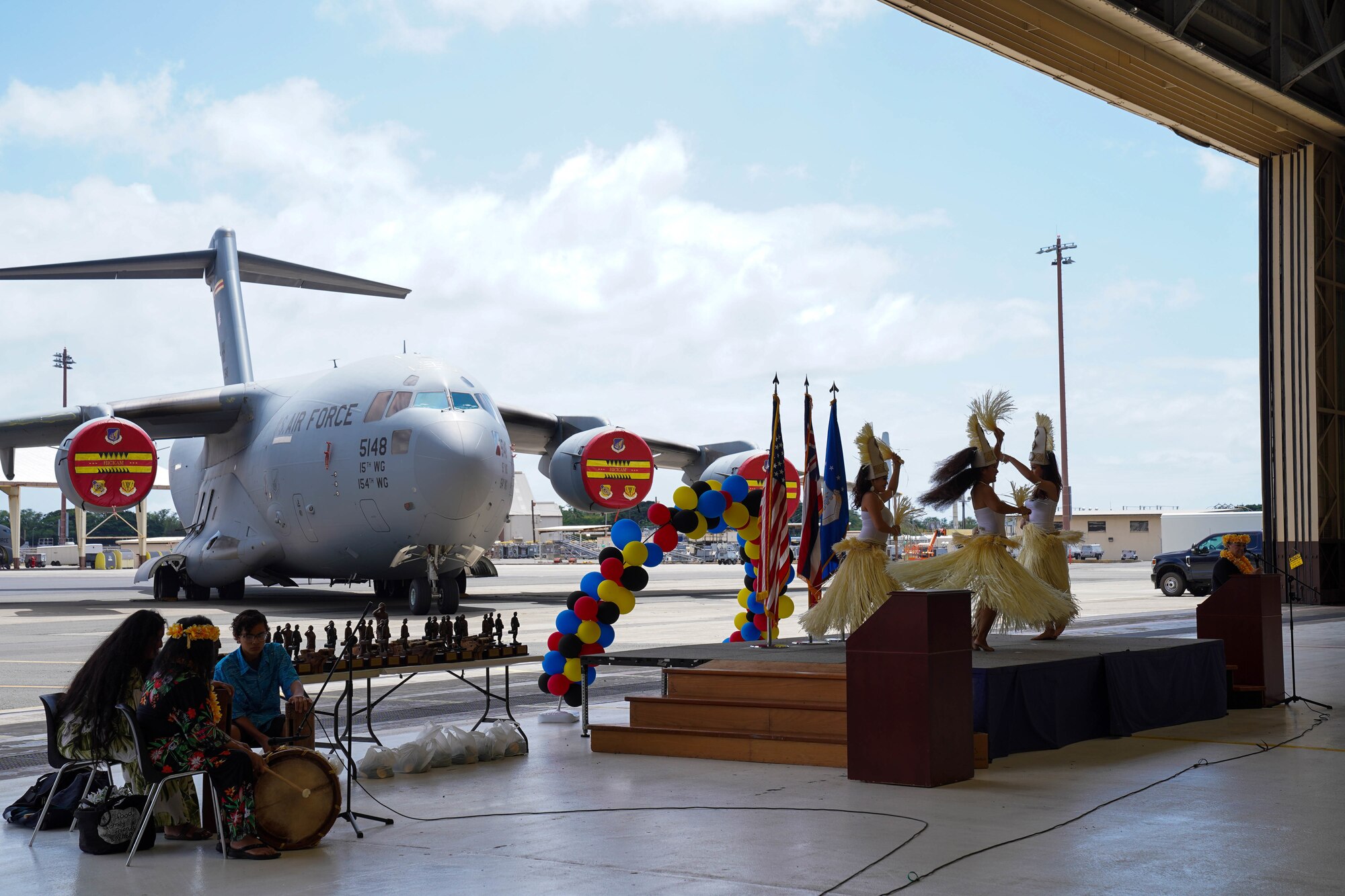 Polynesian dancers perform before the Maintenance Professional of the Year banquet at Joint Base Pearl Harbor-Hickam, Hawaii March 25, 2022. Members from the 15th Wing and 154th Wing maintenance groups earned awards for their performance and contributions during 2021. (U.S. Air Force photo by Airman 1st Class Makensie Cooper)