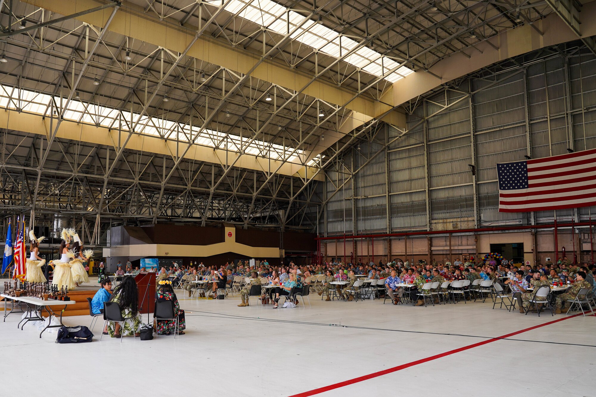 Polynesian dancers perform before the Maintenance Professional of the Year banquet at Joint Base Pearl Harbor-Hickam, Hawaii March 25, 2022. Members from the 15th Wing and 154th Wing maintenance groups earned awards for their performance and contributions during 2021. (U.S. Air Force photo by Airman 1st Class Makensie Cooper)