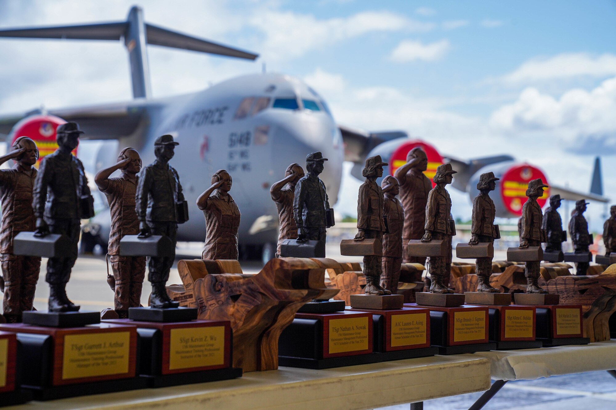 Awards sit on display during the Maintenance Professional of the Year Banquet at Joint Base Pearl Harbor-Hickam, Hawaii, March 25, 2022. Members from the 15th Wing and 154th Wing maintenance groups earned awards for their performance and contributions during 2021. (U.S. Air Force photo by Airman 1st Class Makensie Cooper)