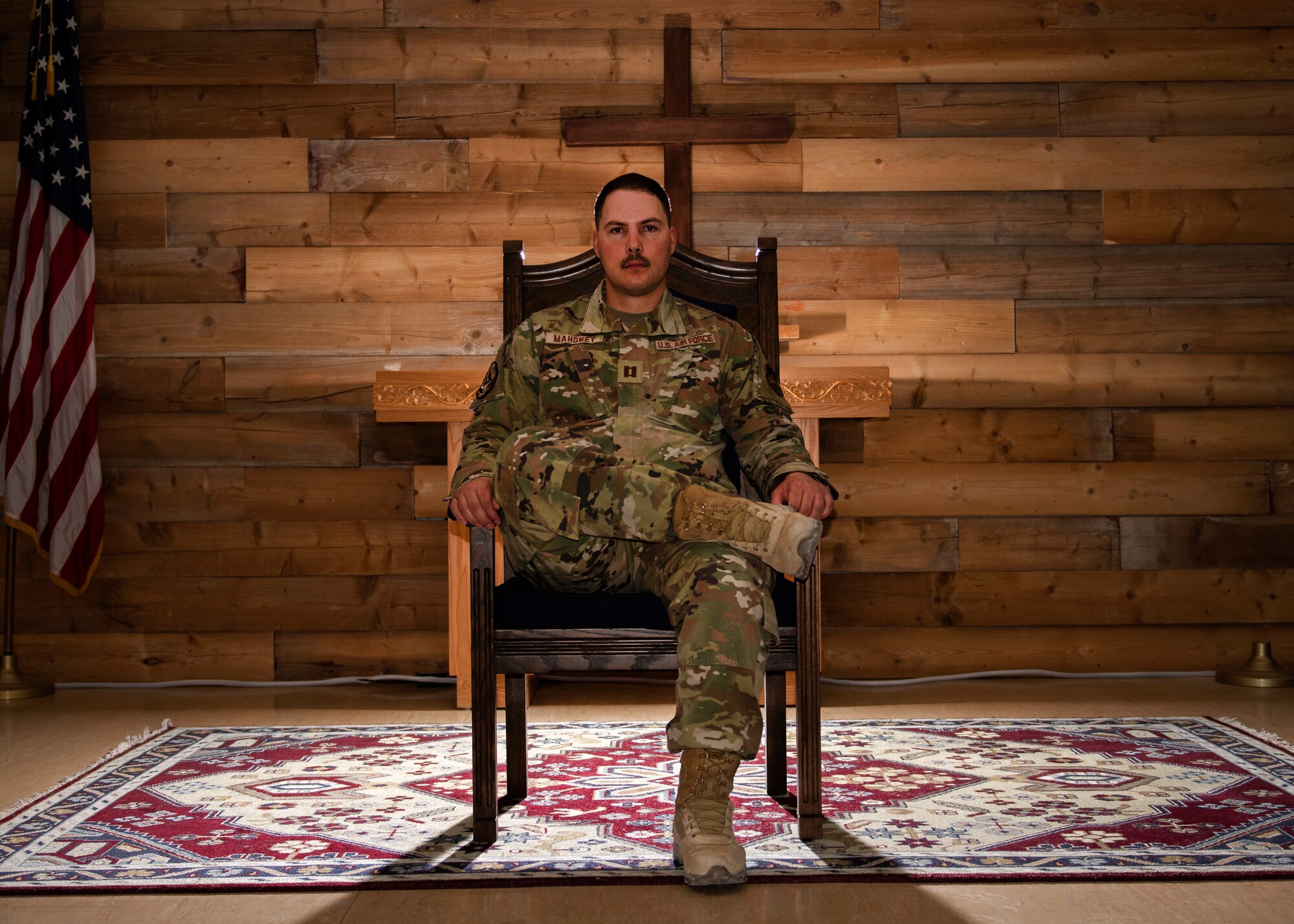 photo of an Air Force chaplain sitting in the chapel