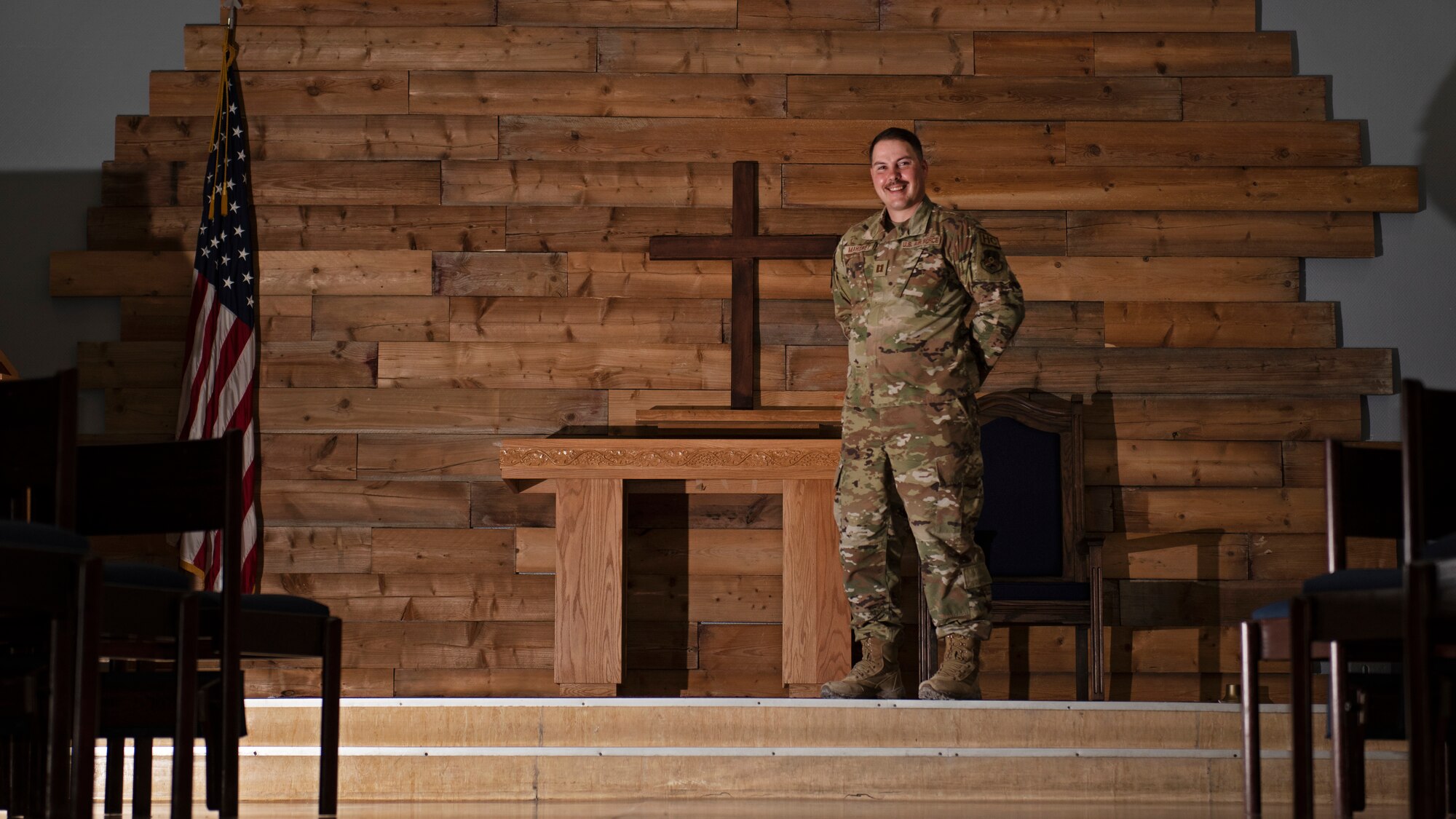 photo of an Air Force chaplain standing in the chapel