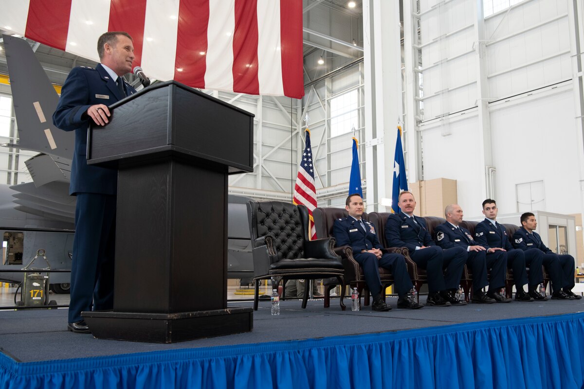 The Air Force Reserve Command deputy commander awards the Distinguished Flying Cross to four C-17A Globemaster III aircrew members during a ceremony at Travis Air Force Base, Calif., Apr. 1, 2022. 
Three Reserve Citizen Airmen assigned to the 349th Air Mobility Wing at Travis, and an active duty Airman from the 3rd Wing, Joint Base Elmendorf-Richardson, Alaska, were recognized for answering their nation’s call when they helped evacuate Americans and their allies out of Afghanistan during Operation Allies Refuge in August 2021.
During the ceremony, Maj. Gen. Matthew J. Burger, the former commander of the 349th AMW, presented the medals to Lt. Col. Dominic Calderon, 1st Lt. Kyle Anderson and Master Sgt. Silva Foster, from the 301st Airlift Squadron, and Senior Airman Michael Geller of the 517th Airlift Squadron. 
(U.S. Air Force photo by Grant Okubo)