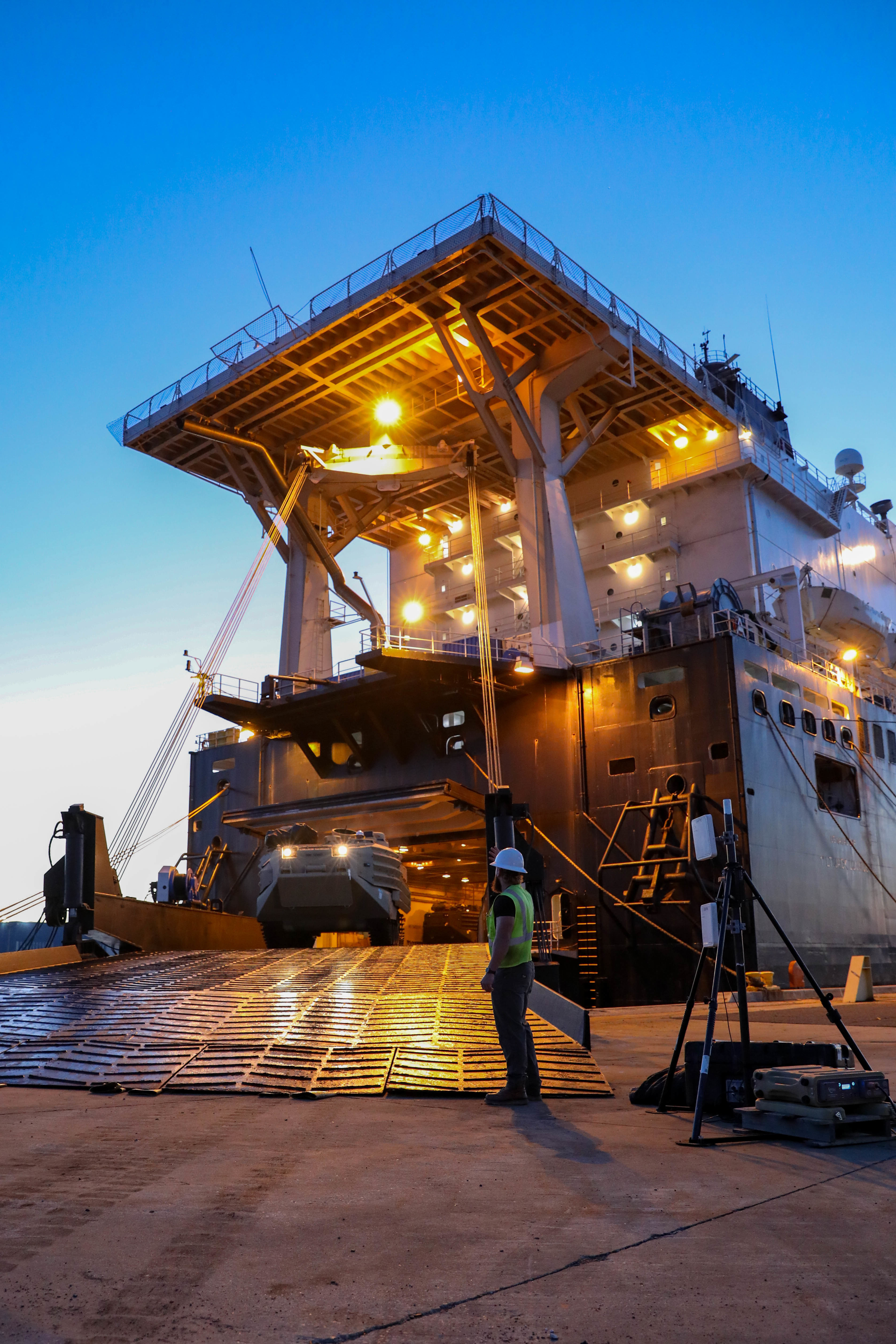 Jackie Thrower, a contractor with Blount Island Command, assists with a maritime prepositioned force offload from the USNS 1st Lt Jack Lummus (T-AK 3011) during exercise Atlantic Dragon on Marine Corps Support Facility Blount Island, Florida, United States, March 17, 2022.