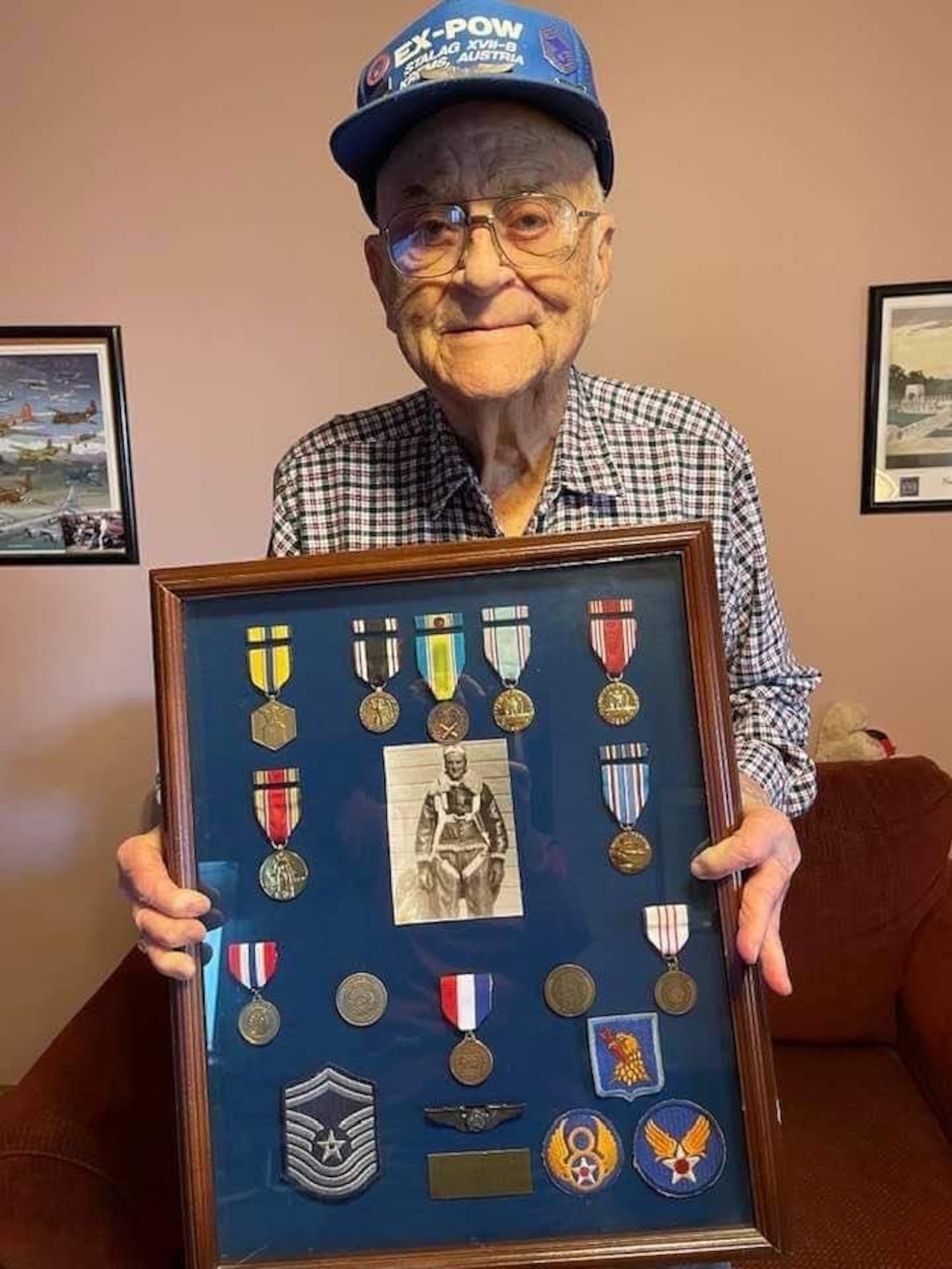U.S. Air Force veteran Charles R. Sibert, poses with his shadow box on Nov. 7, 2021 during his 98th birthday in Belton, Mo. Photo courtesy of Master Sgt. Kim Stone.