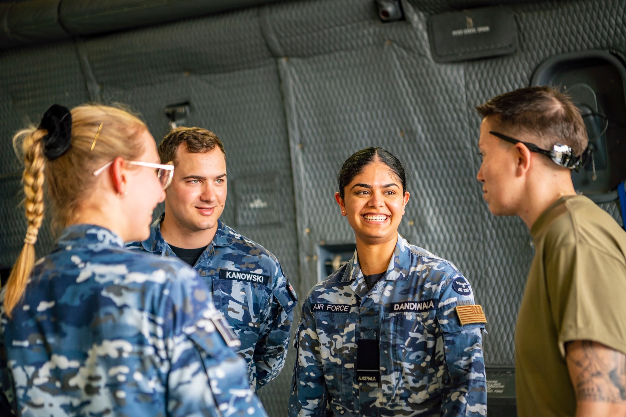 Members of the U.S. Air Force train and celebrate with members of the Royal Australian Air Force.