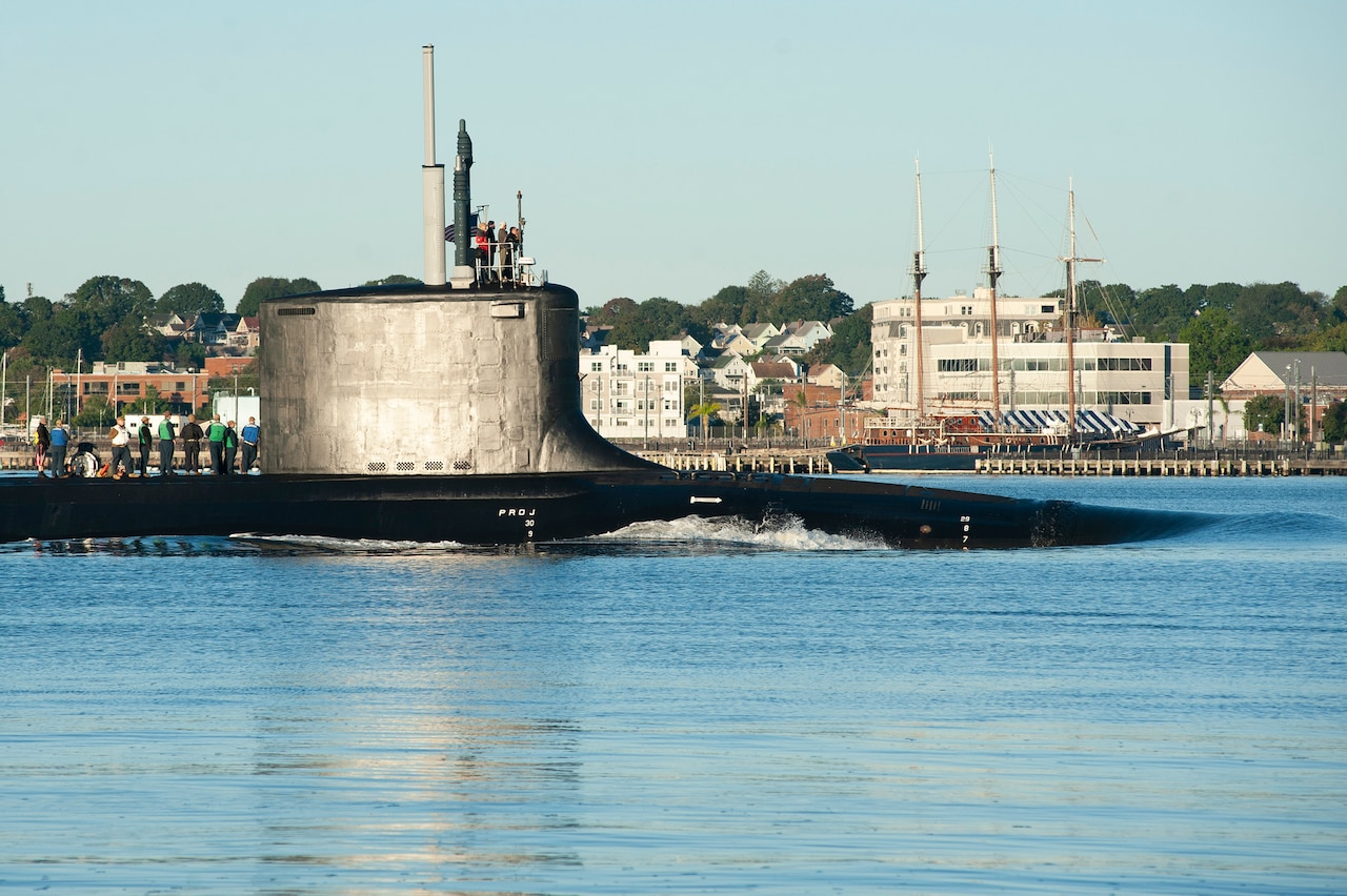 A submarine travels in water.