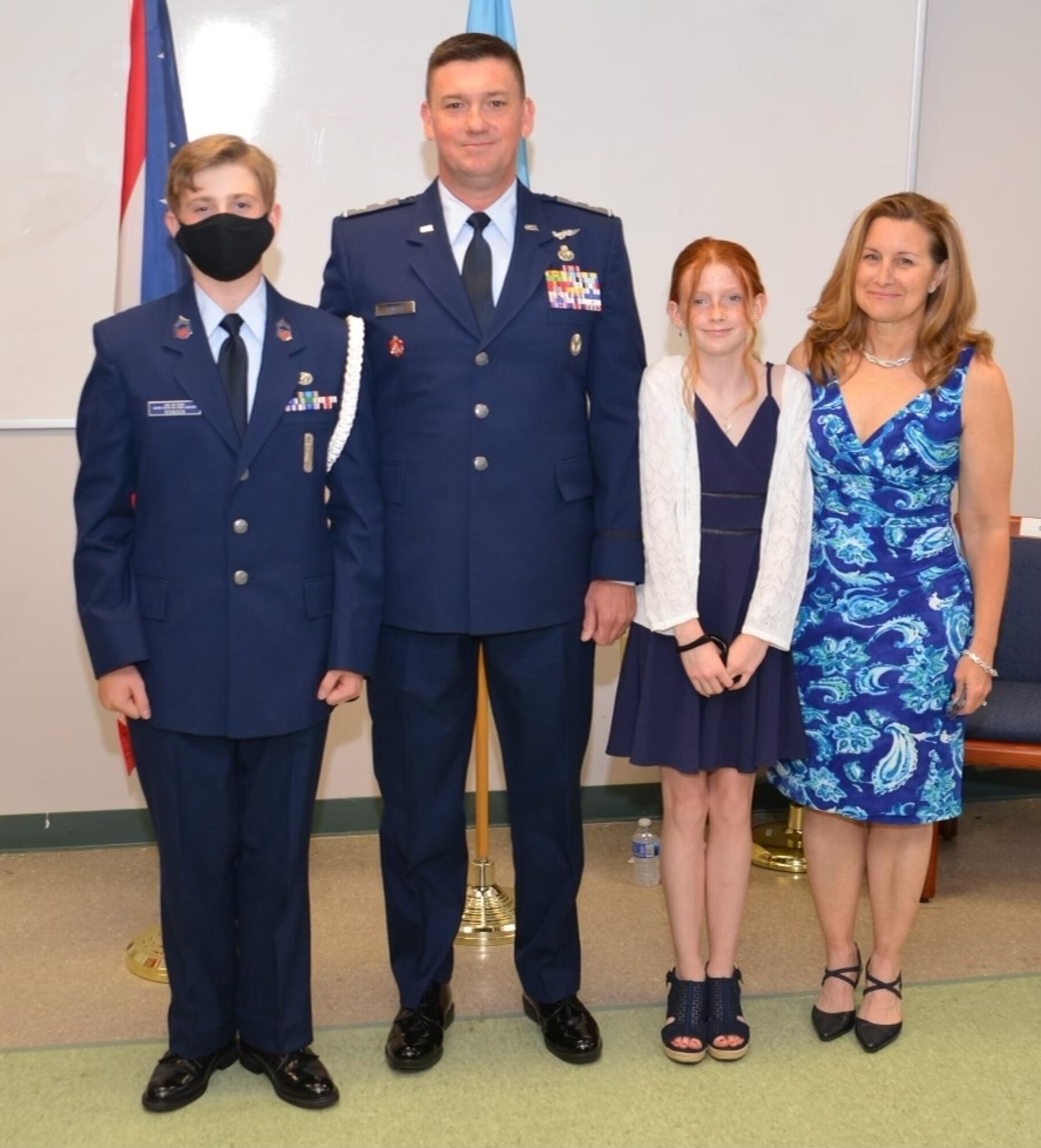 Chief Master Sgt. Peter Bowden, 178th Wing Security Forces Manager, poses with his family. (Photo provided)