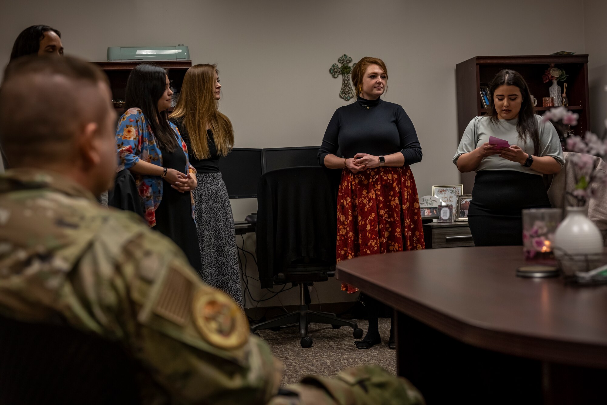 Member of the the 35th Fighter Wing Chapel explains their day to day duties to the commander.