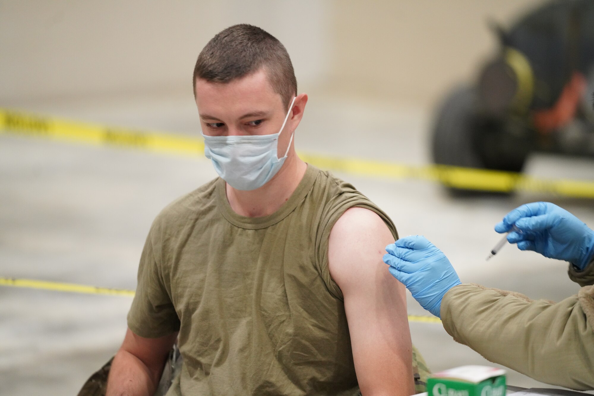 California Air National Guard 2nd Lt. Kenneth Lautner with the 195th Wing receives a flu vaccination at the PHAG2R (Periodic Health Assessment Go 2 Ready) at Channel Islands Air National Guard Station (CIANGS), Port Hueneme, California. November 6, 2021. This two-day event is the first annual PHAG2R for CIANGS. It's objective is to increase efficiency for airmen to complete their medical requirements, maintaining readiness for the whole year in a one-stop shop.