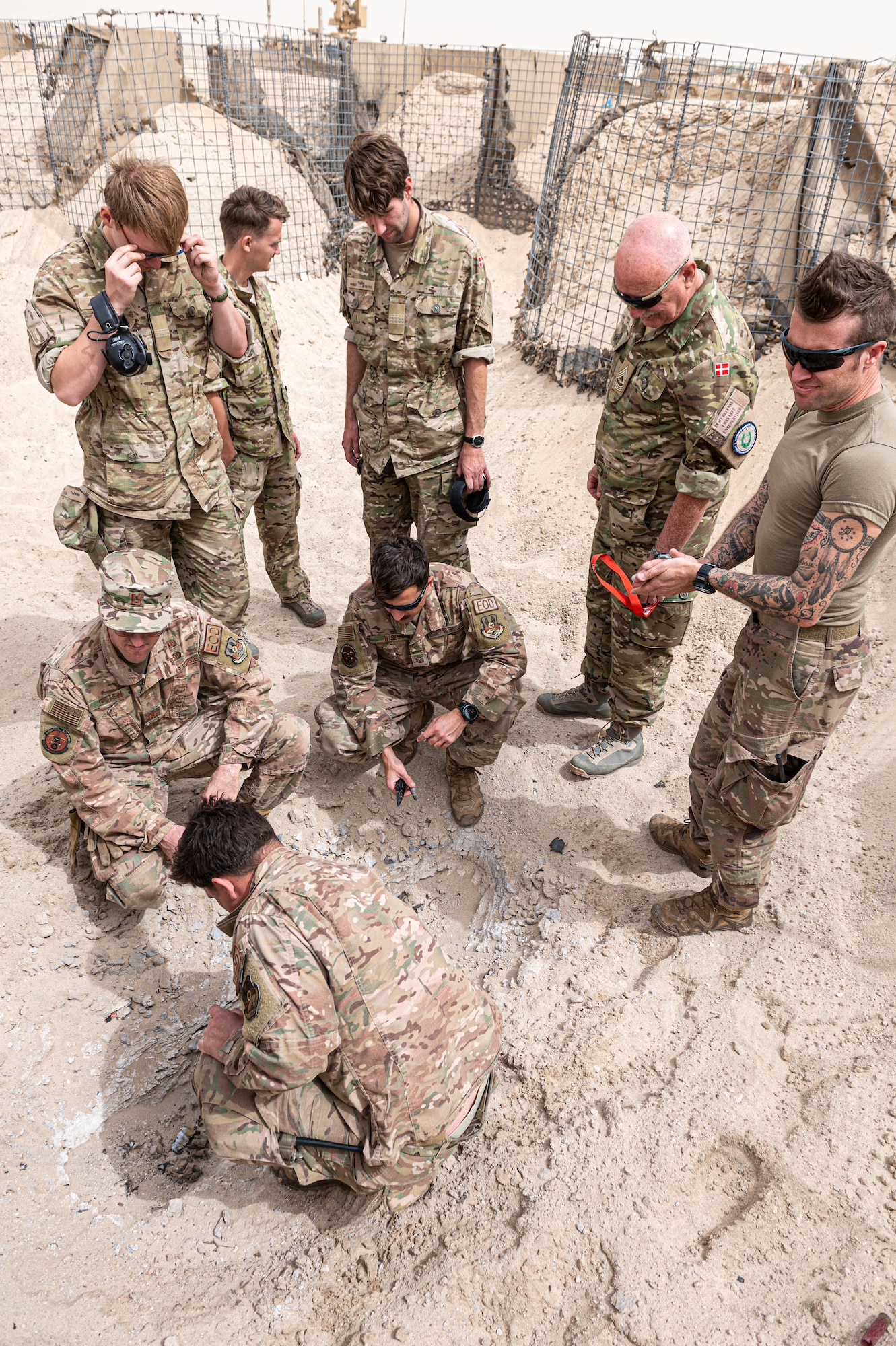 On average, the 386th Expeditionary Civil Engineer Squadron, Explosive Ordnance Disposal flight at Ali Al Salem Air Base has a controlled demolition once a week.  U.S. service members from the Air Force, Army, Marine Corps and coalition partners from Denmark, Italy, and the United Kingdom, participated in a Coalition Demolition Day.