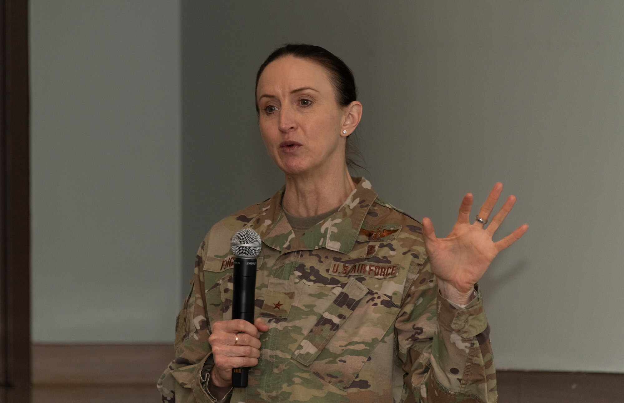 U.S. Air Force Brig. Gen. Anita Fligge, Defense Health Agency chief nursing officer, speaks at the David Grant USAF Medical Center all call at Travis Air Force Base, California, March 31, 2022. During a DGMC tour, Fligge interacted with medical staff while touring multiple facilities. (U.S. Air Force photo by Heide Couch)