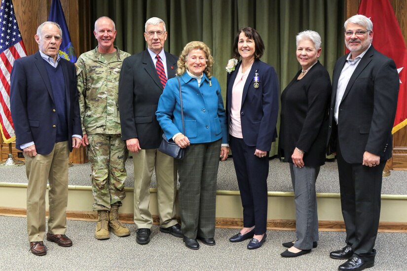 Beth Ann Shuttlesworth, executive assistant to eight of Pennsylvania’s adjutants general during her 35-year career, marked her retirement with a ceremony March 31 at Fort Indiantown Gap. Four former TAGs, the widow of a former TAG, and the current TAG attended the ceremony and shared memories of their time working with Shuttlesworth. From left to right: Maj. Gen. (ret.) William B. Lynch, Maj. Gen. Mark Schindler, Pennsylvania’s current adjutant general, Maj. Gen. (ret.) Wesley Craig, Helen Sajer, the widow of Maj. Gen. Gerald T. Sajer, Beth Ann Shuttlesworth, Maj. Gen. (ret.) Jessica Wright, and Air Force Maj. Gen. (ret.) Anthony Carrelli.