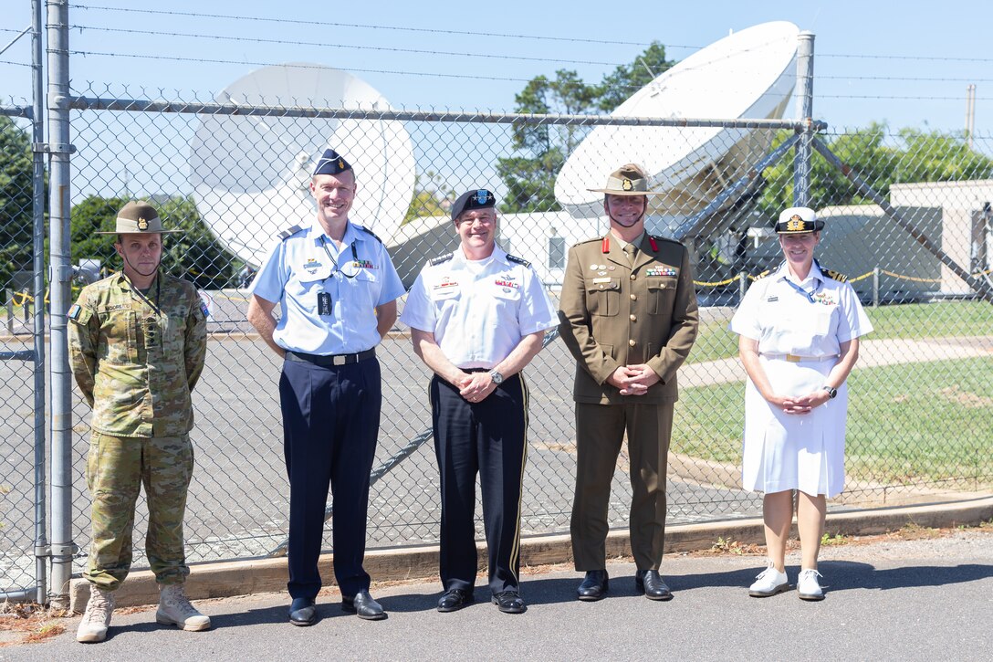 U.S. Space Command commander, U.S. Army Gen. James Dickinson (center), poses for a photograph at Defence Network Operations Centre March 22, 2022. Dickinson met with Maj. Gen. Murray Thompson and Air Commodore Mick Reidy to discuss Australia Defence Force Satellite Operations. Dickinson visited Australia March 20-26, 2022, to attend the Air and Space Power Conference and Defence Space Command activation ceremony as well as meet with senior leaders from Australia, United Kingdom and Germany.