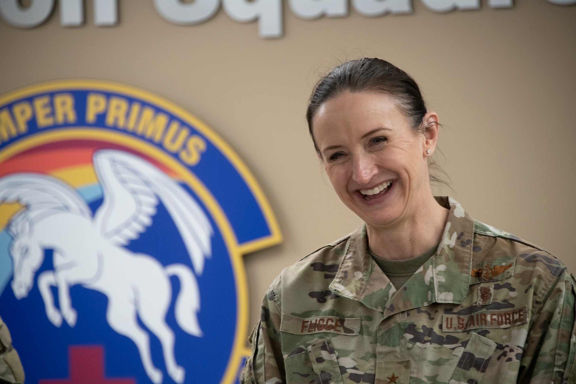 U.S. Air Force Brig. Gen. Anita Fligge, Defense Health Agency chief nursing officer, tours the 60th Aeromedical Evacuation Squadron at Travis Air Force Base, California, March 31, 2022. Fligge was briefed on 60th AES's mission and overall operations, and spoke with flight nurses and medical technicians. (U.S. Air Force photo by Heide Couch)