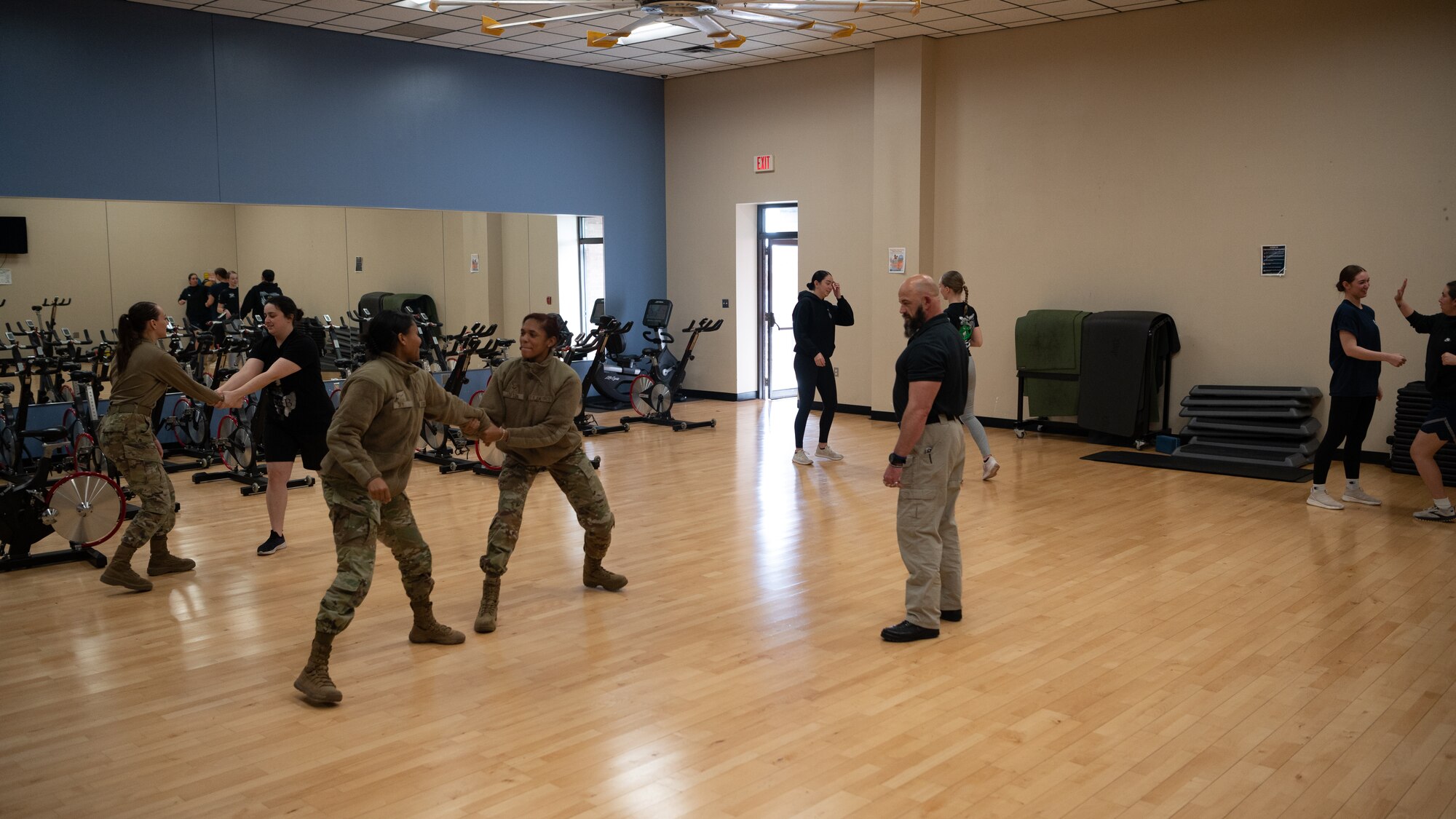 Members of Team Whiteman spar with each other during a women's self defense class.