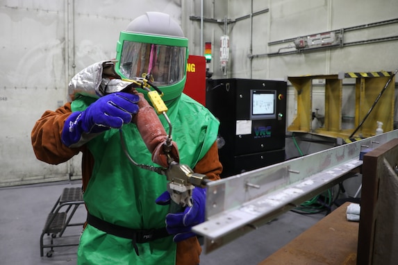 A welder at Letterkenny Army Depot demonstrates the cold spray advanced manufacturing initiative Feb. 2.