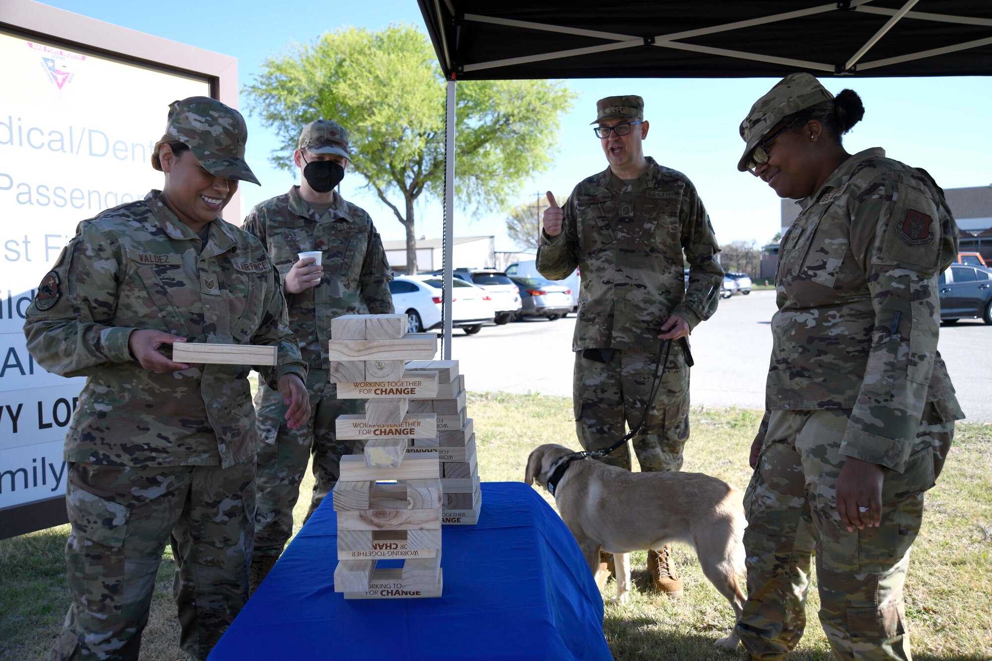 Tech. Sgt. Famari Valdez, 301 st Fighter Wing Medical Squadron mental health

technician, pulls a wooden game piece during the Sexual Assault Prevention and Response meet and greet

at Naval Air Station Joint Reserve Base Fort Worth, Texas, April 2, 2022. The SAPR team provided

outdoor games and talking points to encourage conversations and fellowship.