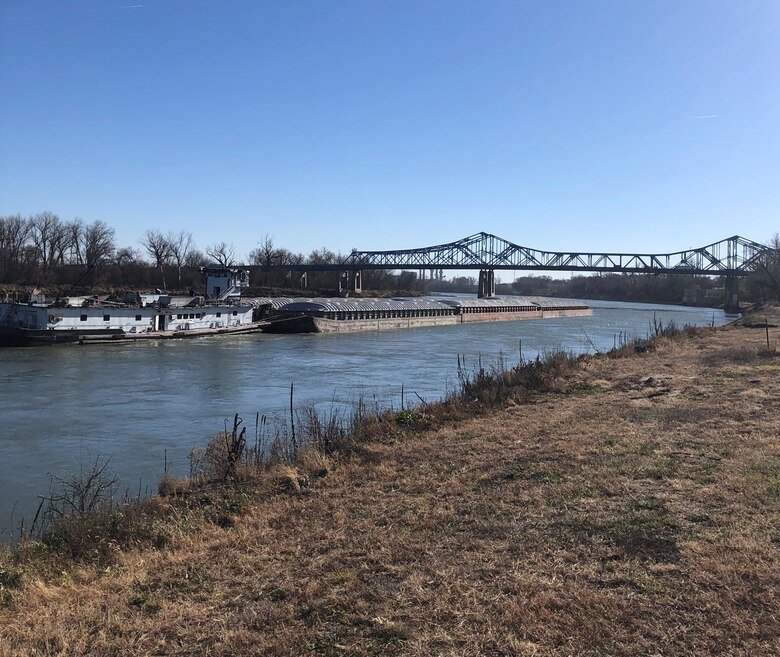 Missouri River downstream view from the Omaha District's Missouri River Project Office. The bridge and extends for about 1.5 miles to the OPPD North Omaha Powerplant intake (Smoke stacks visible under left span of bridge) and the MUD Florence Water treatment Plant intake is visible under the right span.