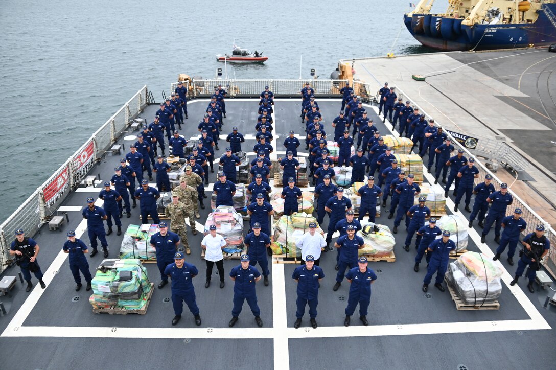The Coast Guard Cutter Kimball (WMSL-756) crew offloads about 11,300 pounds of cocaine and roughly 4,000 pounds of marijuana worth more than $223 million on March 31, 2022, in San Diego. (U.S. Coast Guard photo by Petty Officer 3rd Class Alex Gray)