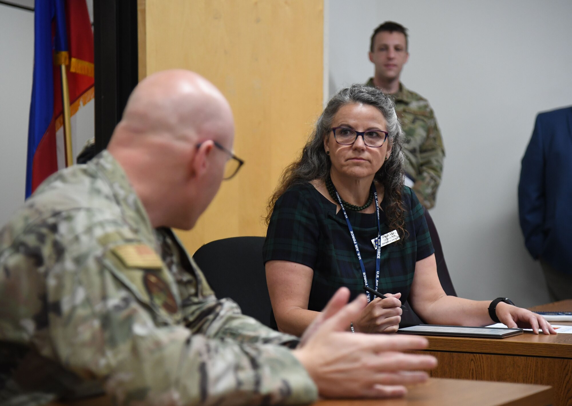U.S. Air Force Lt. Col. Jeremy Sparks, 333rd Training Squadron commander, briefs Dr. Wendy Walsh, Air Education and Training Command chief learning officer, on the 333rd mission capabilities, inside Stennis Hall at Keesler Air Force Base, Mississippi, March 30, 2022. Walsh visited the 81st Training Group squadrons in order to become more familiar with their training and mission capabilities. (U.S. Air Force photo by Kemberly Groue)
