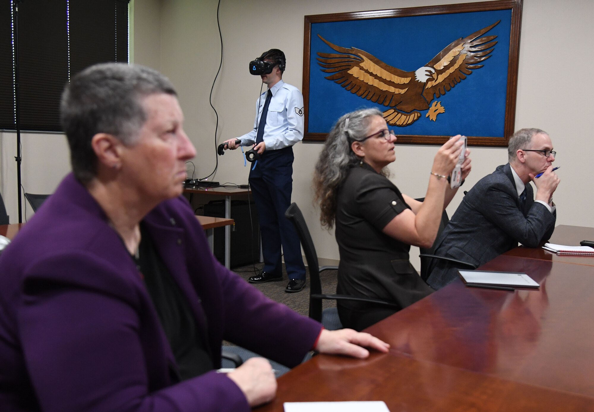 Dr. Wendy Walsh, Air Education and Training Command chief learning officer, receives a virtual reality demonstration developed by the 81st Training Support Squadron inside the Trainer Development Center at Keesler Air Force Base, Mississippi, March 31, 2022. Walsh visited the 81st Training Group squadrons in order to become more familiar with their training and mission capabilities. (U.S. Air Force photo by Kemberly Groue)