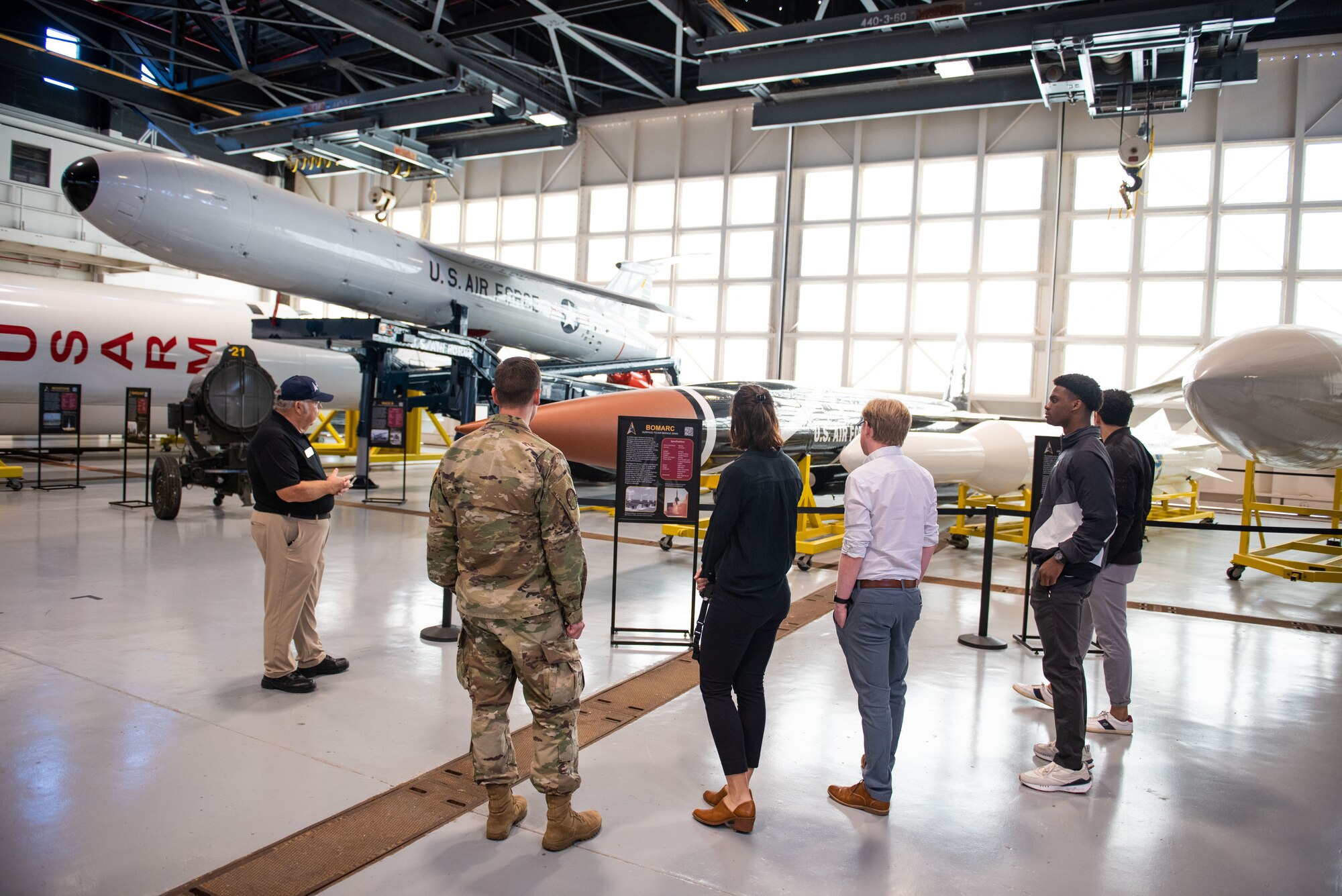 Graduate students from George Washington University visit Cape Canaveral Space Force Station, March 14, 2022, at CCSFS, Fla. The 5th Space Launch Squadron Falcon Flight has been working with four students from George Washington University through a National Security Innovation Network program called ‘Hacking for Defense’ (H4D) to better leverage historical SpaceX launch data to more efficiently and accurately assess mission risk and execute launch vehicle processing. (U.S. Space Force photo by Amanda Ryrholm)