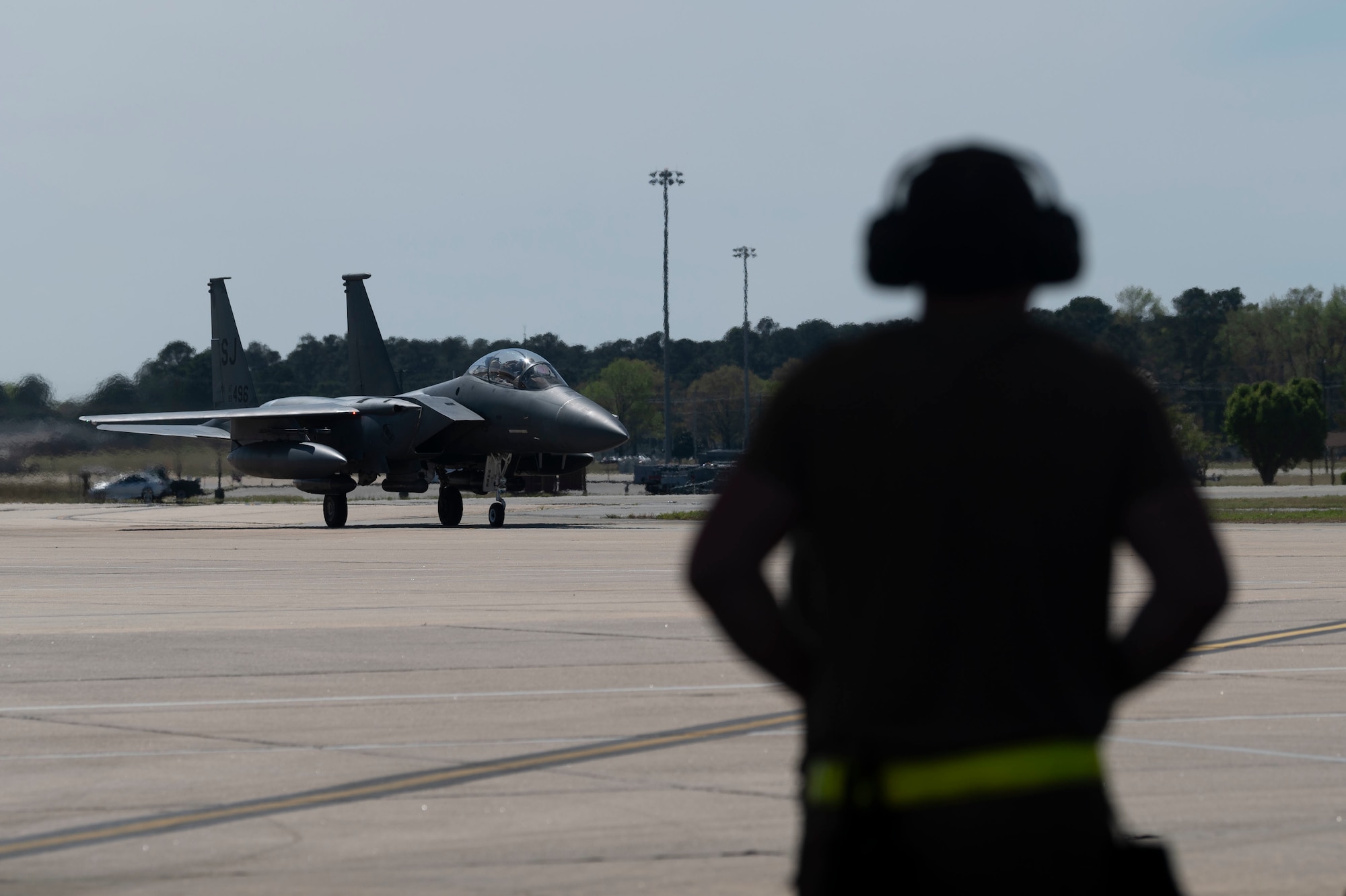Airmen assigned to the 4th Fighter Wing arrive at Seymour Johnson Air Force Base, North Carolina, after returning from a deployment April 1, 2022. The Airmen and aircraft deployed to Europe in support of NATO operations where they ensured a protective posture of United States allies. (U.S. Air Force photo by Senior Airman Kevin Holloway)