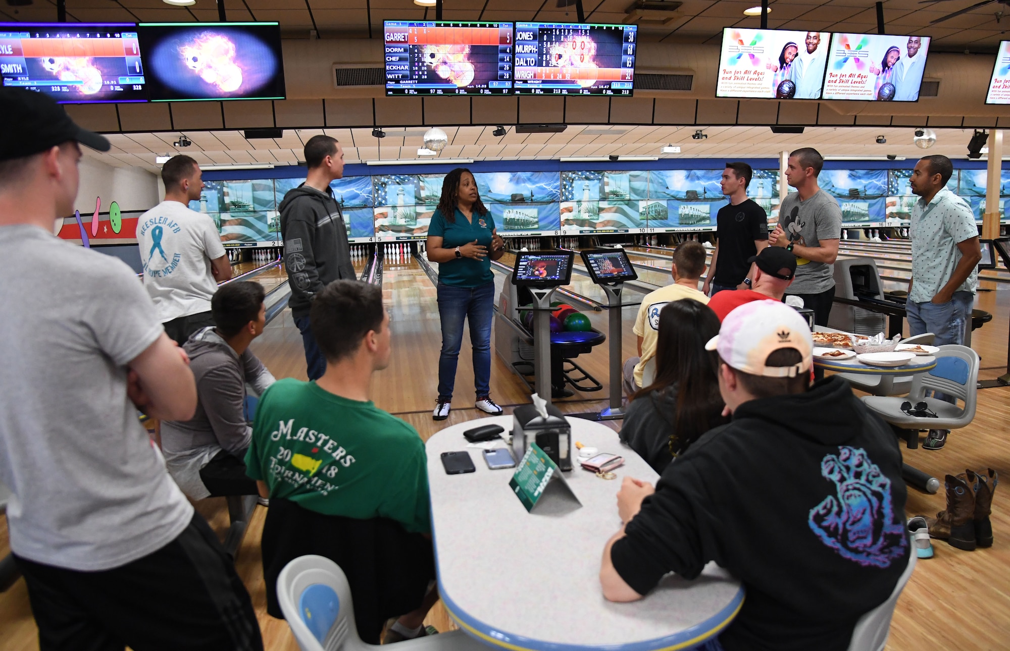 D'Angellette Woods, 81st Training Wing sexual assault response program specialist, delivers remarks during the Strike Out Sexual Assault Bowling Tournament inside Gaude Lanes at Keesler Air Force Base, Mississippi, April 1, 2022. The event was held in awareness of Sexual Assault and Awareness Prevention Month which is recognized throughout April. (U.S. Air Force photo by Kemberly Groue)