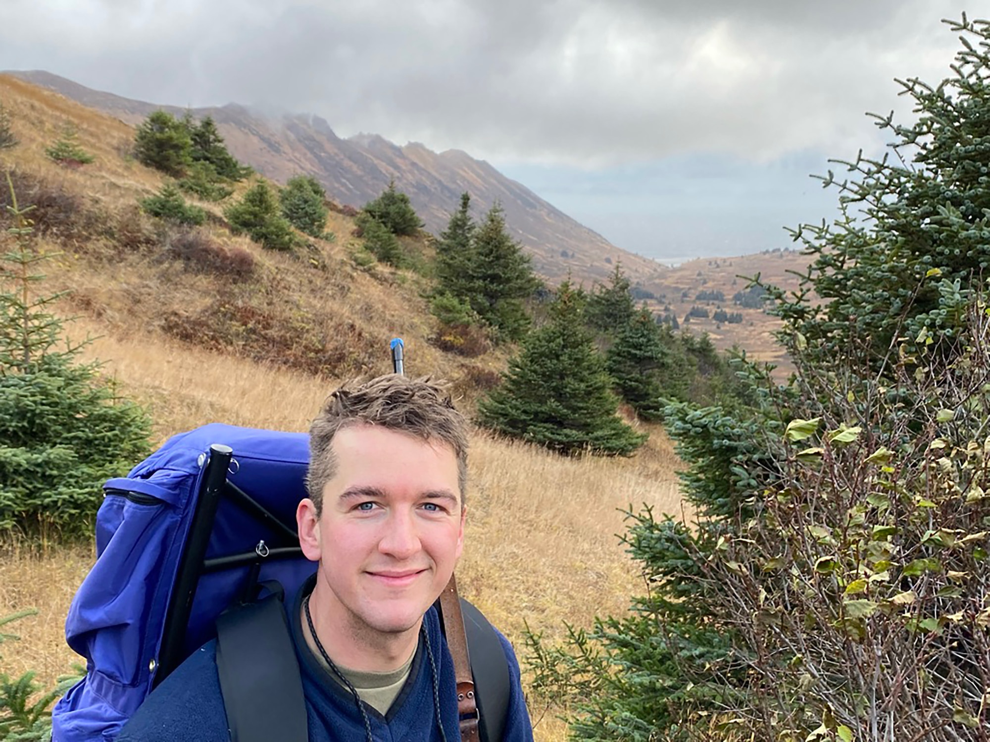 Off-duty Senior Airman Brady Penn, during a recent elk registration hunt on Afognak Island, Alaska, Oct. 14, 2021. During his hunt, Penn and his father survived an attack by a Kodiak Grizzly bear.