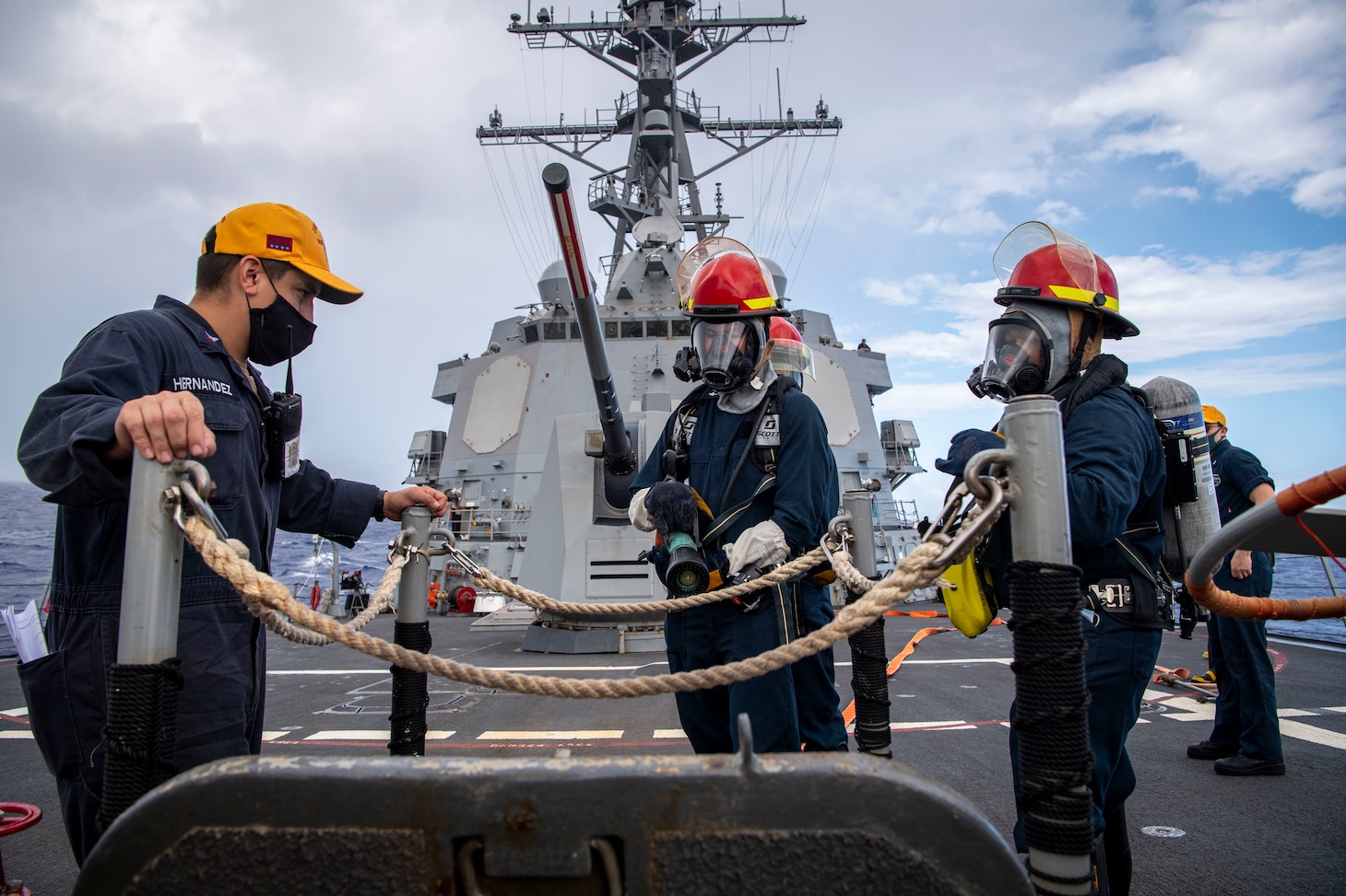 Sailors assigned to the Arleigh Burke-class guided-missile destroyer USS Dewey (DDG 105) participate in a Damage Control Training Team drill during Surface Warfare Advanced Tactical Training (SWATT). SWATT provides the Fleet opportunities to complete the tactical exercise required for increased lethality and tactical proficiency.