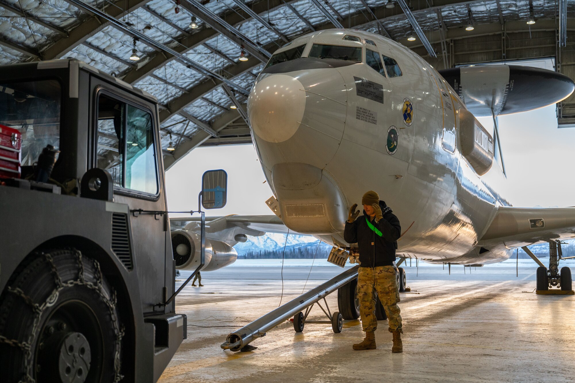 A photo of an E-3 Sentry AWACS sitting in a hangar