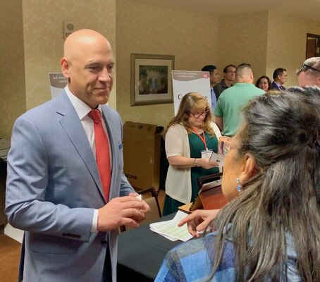 PHOENIX – U.S. Army Corps of Engineer Los Angeles District’s deputy of the Small Business program Eric Ravelli speaks with participants of the Spring Business Opportunities Open House March 30 at the midtown Hilton Garden Inn. Small businesses represented 78 percent of the participants. This is Ravelli’s fifth year hosting the event for the LA District. (Photo by Robert DeDeaux, Los Angeles District PAO)