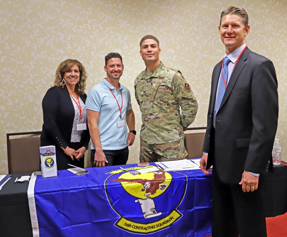 PHOENIX – The 56th Contracting Squadron Small Business Representatives Mary Peetz, Josh Wolery, and airman Richard Jimenez join U.S. Army Corps of Engineer Los Angeles District Deputy Engineer David Van Dorpe for photos during the Spring Business Opportunities Open House March 30 at the midtown Hilton Garden Inn. The Los Angeles District hosts the Business Opportunities Open House semi-annually in the Spring and Fall. (Photo by Robert DeDeaux, Los Angeles District PAO)