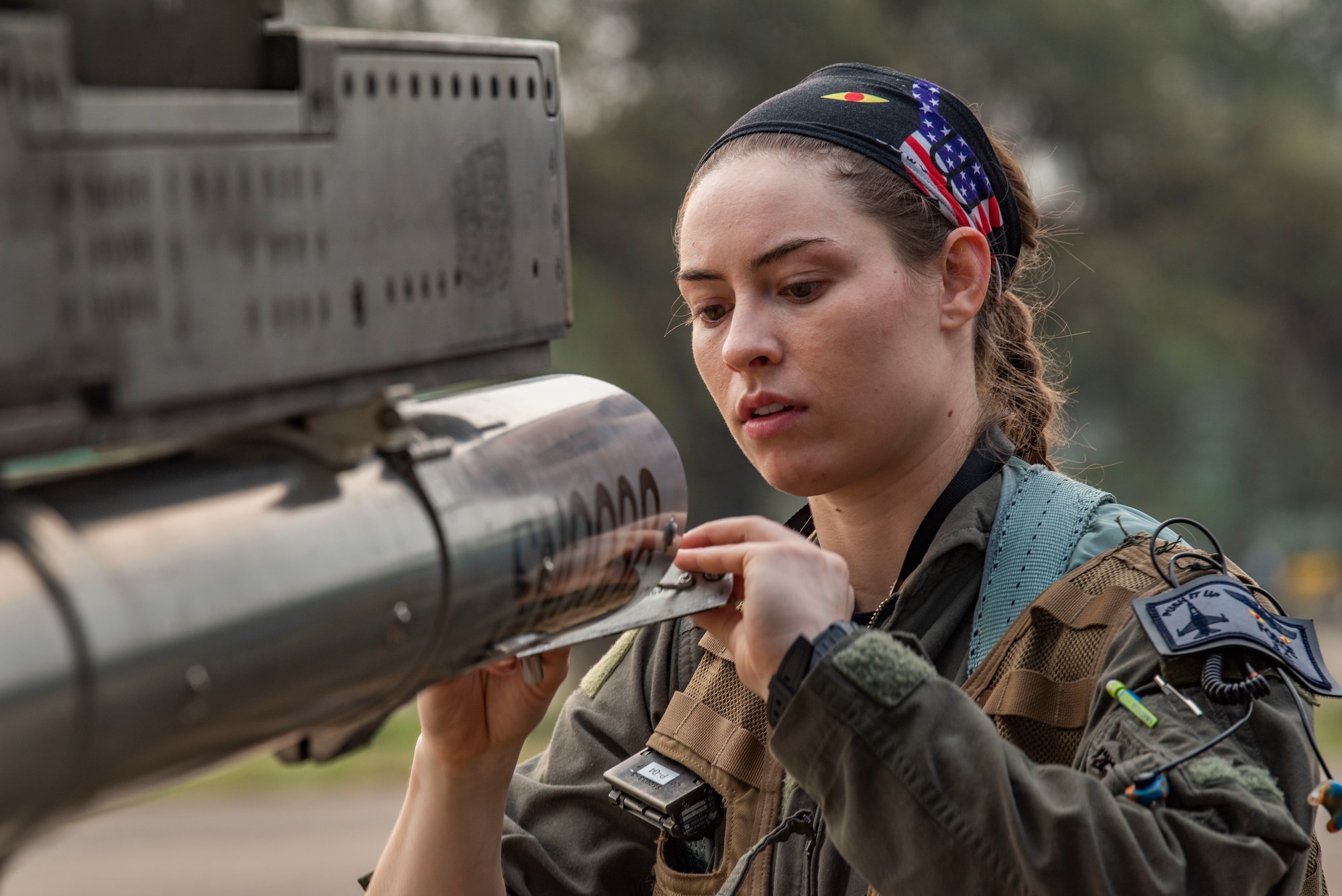 First Lt. Samantha “Force” Colombo, 35th Fighter Squadron pilot, inspects an F-16 Fighting Falcon prior to flight during Cope Tiger 2022 at Korat Royal Thai Air Base, Thailand, March 18, 2022. Colombo is currently the only female fighter pilot stationed at Kunsan Air Base, Republic of Korea. (U.S. Air Force photo by Staff Sgt. Jesenia Landaverde)