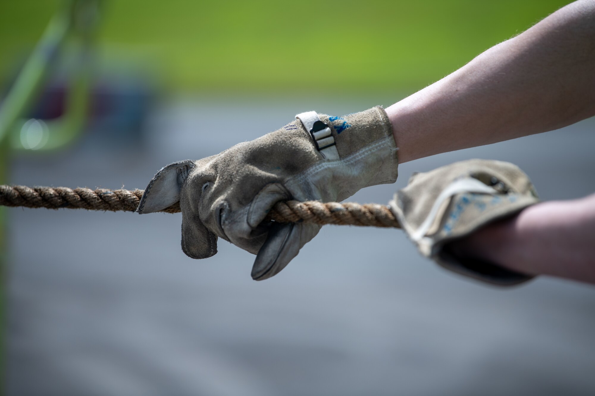 Airman pulls rope.