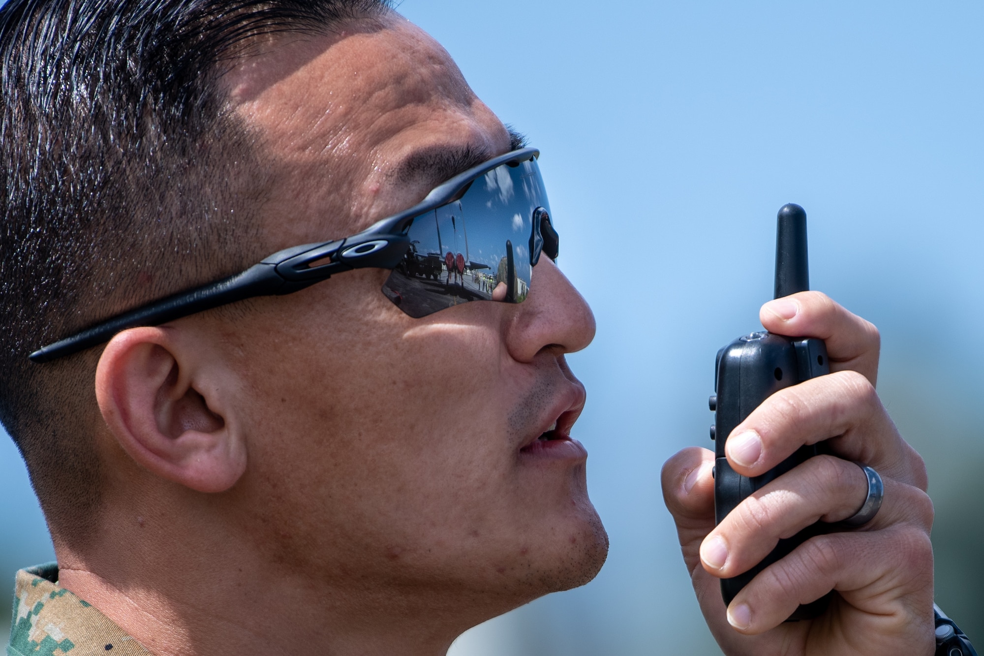 Marine communicates with a radio