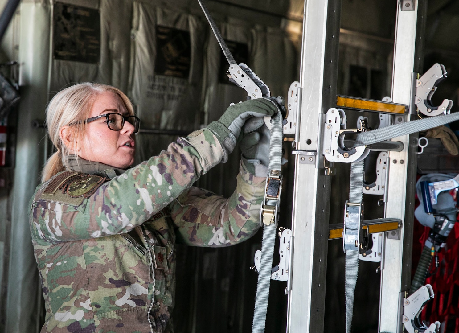 Maj. Tammy Ostrowski, senior flight nurse from the 139th Aeromedical Evacuation Squadron, Scotia, New York, conducts preflight checks before loading simulated patients during Arctic Eagle-Patriot 22 Joint Base Elmendorf-Richardson, Alaska, March 2, 2022. AEP22 enhances the ability of military and civilian partners to accomplish emergency response and homeland security missions in and around the Arctic.