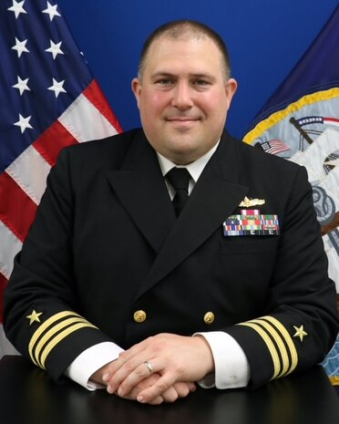 Cmdr. Adam J. Ochs