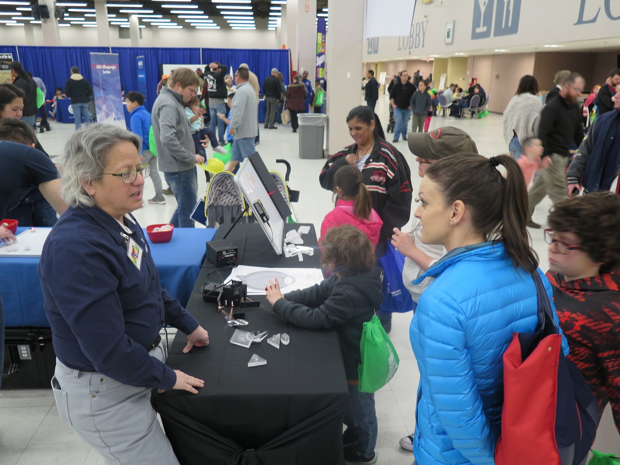 Air Force Research Laboratory senior scientist Dr. Imelda Atencio speaks with students at AFRL's Second Annual Super STEM Saturday event held in Albuquerque Feb. 23, 2019. (U.S. Air Force Photo / Stephen Burke)