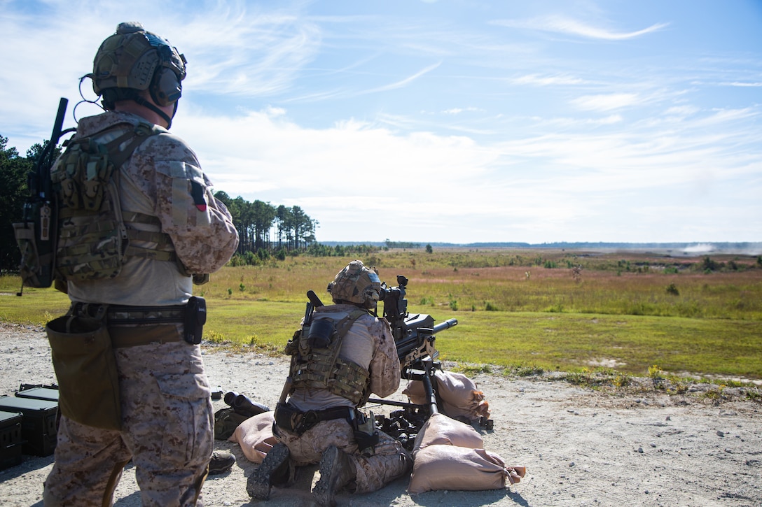 Marine Raiders fire the Mk 19 grenade launcher during a company training event in Jacksonville, N.C., Oct. 1, 2021. The Marine Raiders refined their marksmanship techniques on various weapons systems including sniper rifles, machine guns and grenade launchers prior to conducting team level training. (U.S. Marine Corps photo by Cpl. Ethan Green)